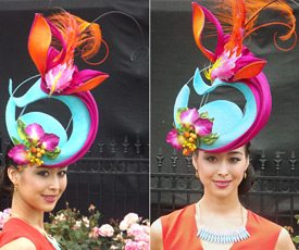Melbourne's Oaks Day 2013 and Louise Macdonald's entry in the professional millinery competition: model Jodie Fiala wore a sculpted sinamay piece trimmed with flowers and berries (the bird was made of fabric and feathers)
